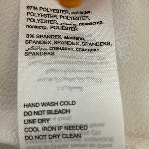 Bebe white button back crop top blouse with fluttery half length flare sleeves - Picture 7 of 7